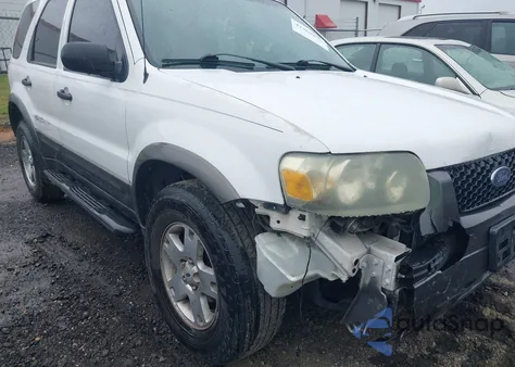 2005 Ford Escape Xlt z USA, uszkodzony, nr VIN 1FMCU03195KB11045